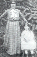 Black and white photo showing woman and child. Black and white photo showing woman and child.