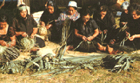 Photo showing people weaving. Photo showing people weaving.