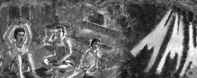 Three people sitting, with hazy images like ghosts to their right.